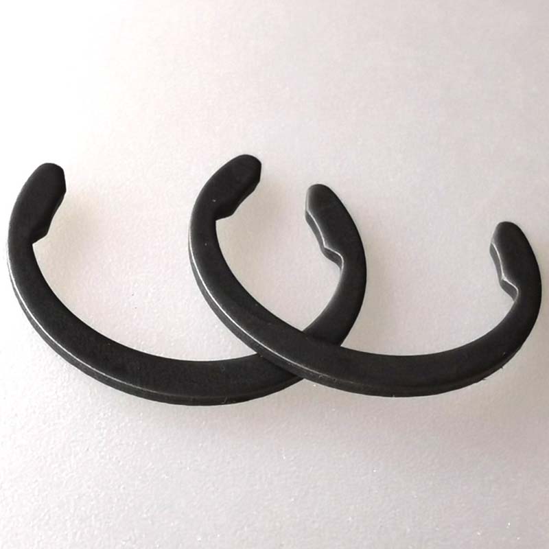 Kolstålfjäderfästringar