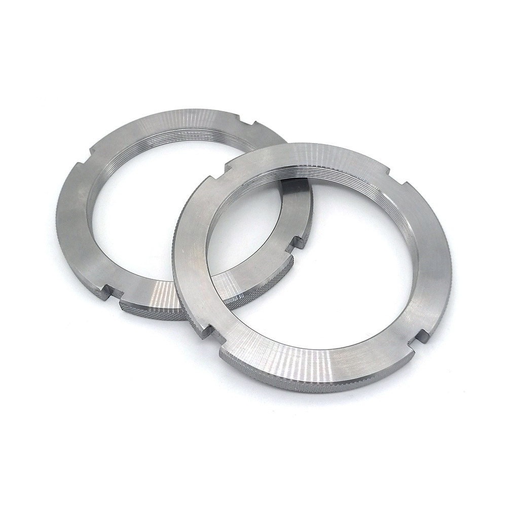 Helgängade runda muttrar