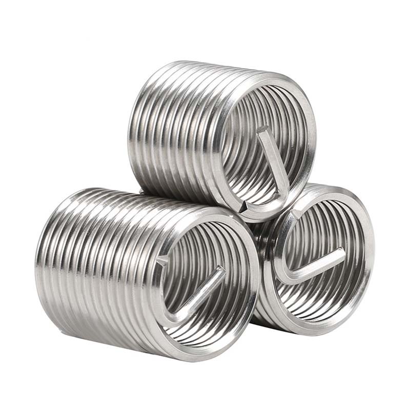 Spiralformade trådinsatser